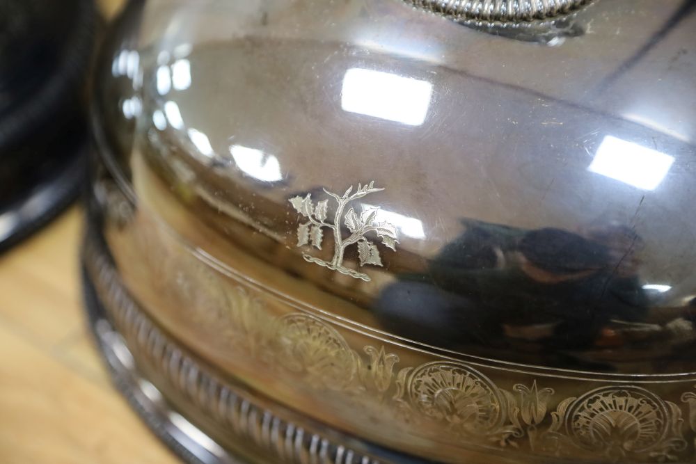 A pair of Victorian silver plated meat domes